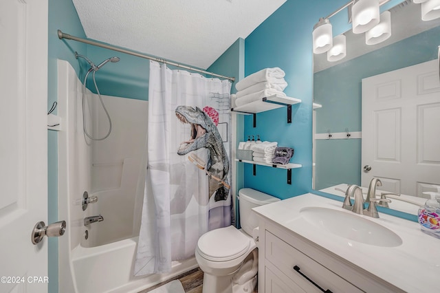 full bathroom featuring hardwood / wood-style floors, a textured ceiling, toilet, shower / tub combo with curtain, and vanity