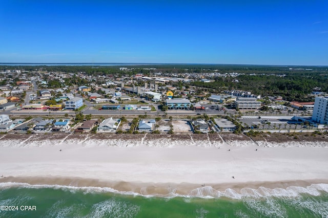 bird's eye view with a water view and a view of the beach