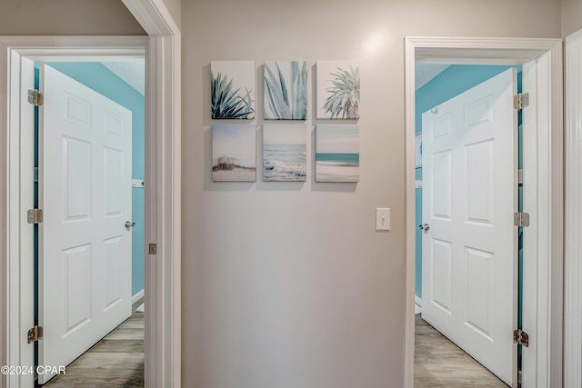 hallway with light wood-type flooring