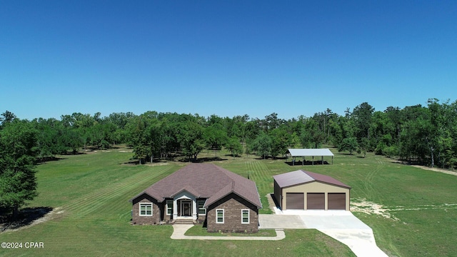 birds eye view of property with a rural view