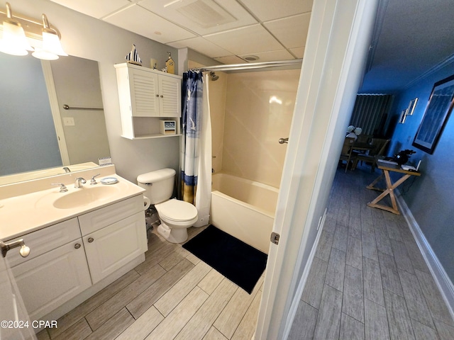 full bathroom with toilet, vanity, shower / tub combo, and hardwood / wood-style flooring