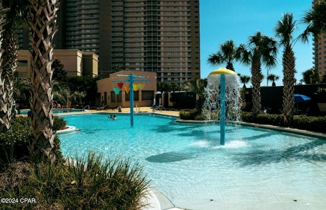 view of pool featuring pool water feature