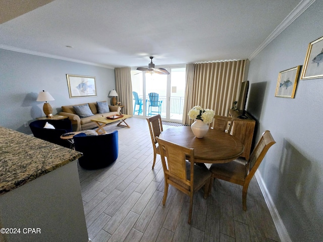 dining space featuring hardwood / wood-style floors, a textured ceiling, and crown molding