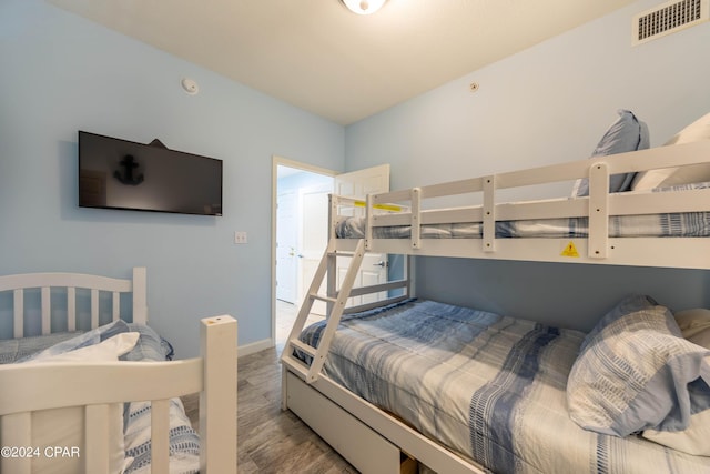 bedroom featuring wood-type flooring