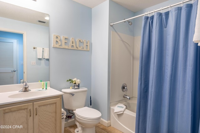 full bathroom with tile patterned flooring, vanity, shower / bath combination with curtain, and toilet