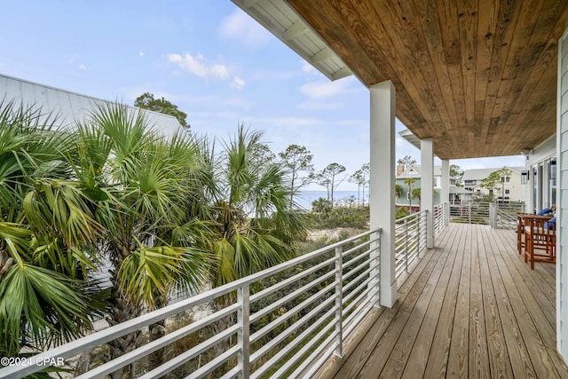 deck featuring a water view