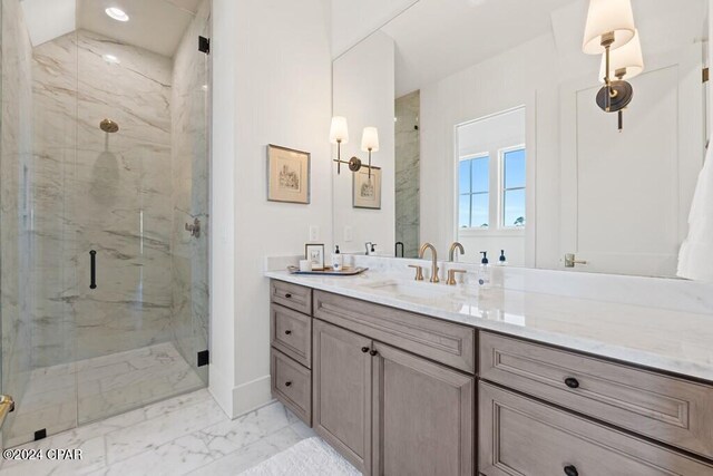 bathroom featuring vanity and walk in shower