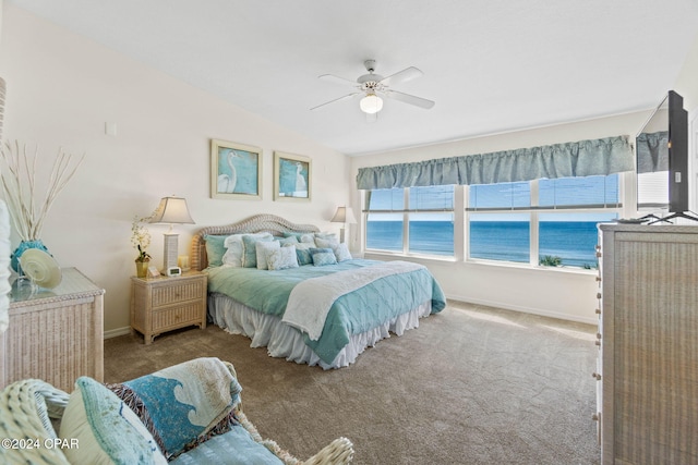 bedroom featuring ceiling fan, light carpet, and lofted ceiling