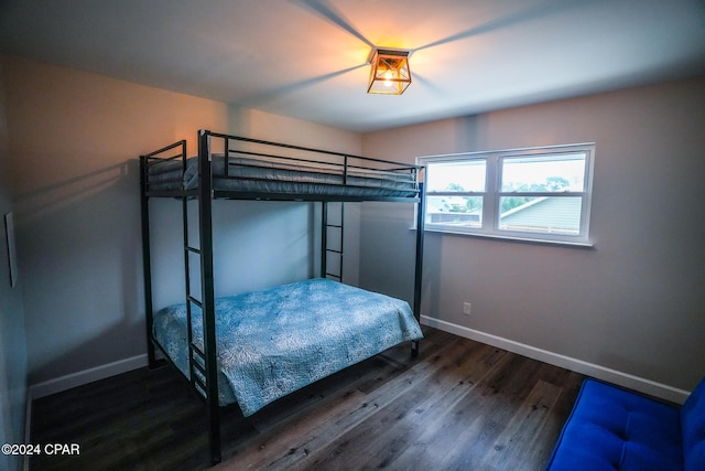 unfurnished bedroom featuring dark hardwood / wood-style flooring