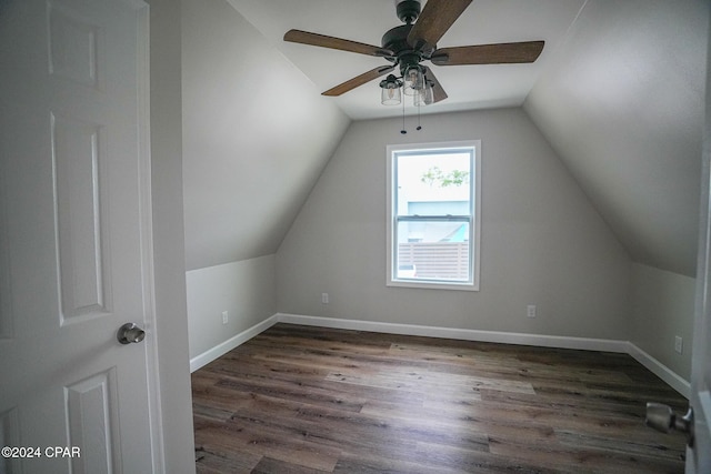 bonus room featuring dark wood-type flooring, ceiling fan, and lofted ceiling