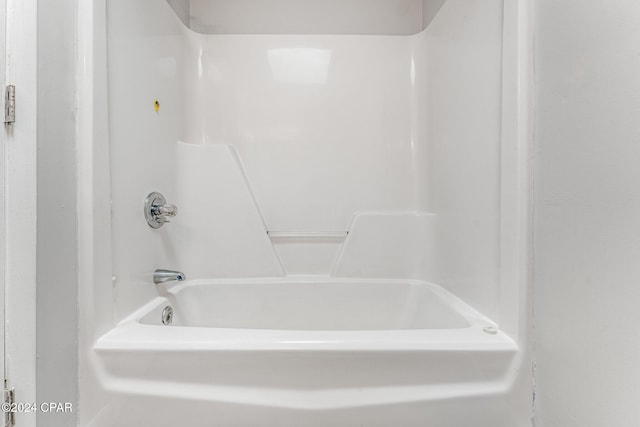 bathroom with shower / tub combination