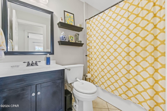 full bathroom with tile patterned floors, vanity, toilet, and shower / bath combo