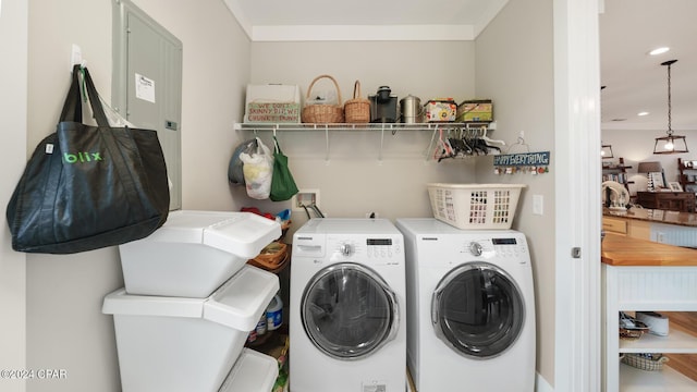 washroom with washing machine and dryer, laundry area, and recessed lighting