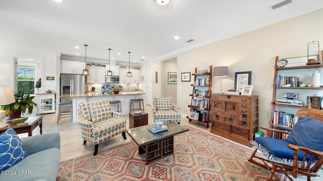 living room featuring light hardwood / wood-style flooring