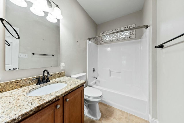 full bathroom featuring toilet, vanity, and tub / shower combination