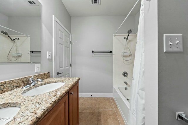 bathroom with tile patterned flooring, vanity, and shower / bathtub combination with curtain