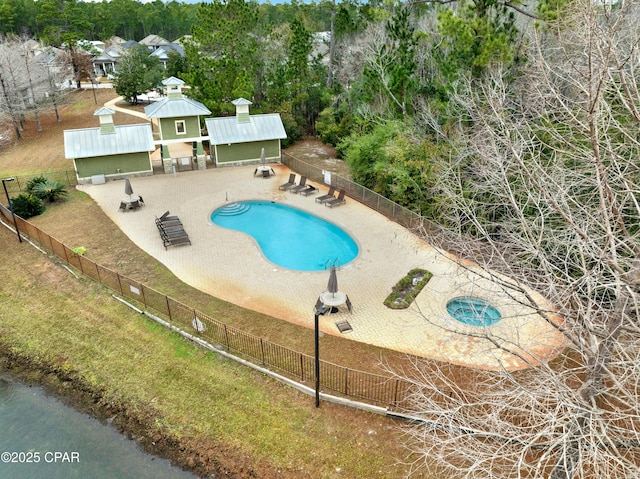 view of swimming pool featuring a patio area