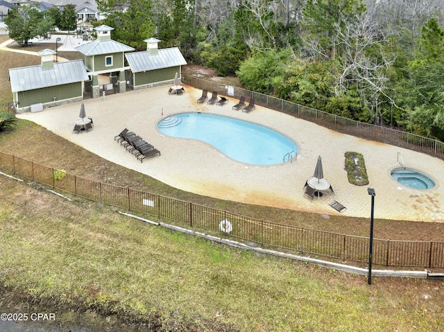 view of swimming pool featuring a patio area