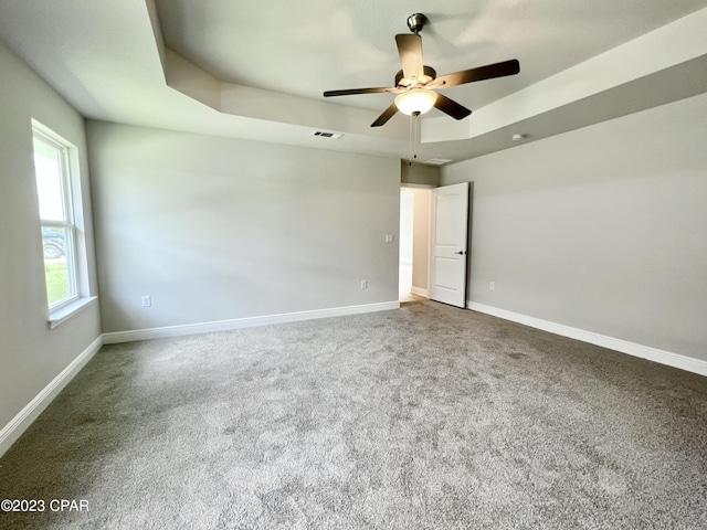 1202 Primrose Ln, Panama City, FL 32404 - spare room featuring carpet floors, a ceiling fan, and baseboards