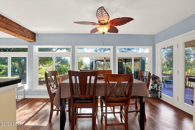 sunroom / solarium featuring ceiling fan