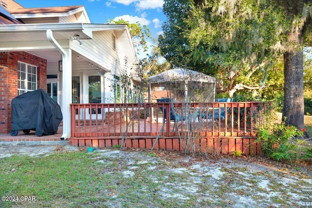 view of yard featuring a deck