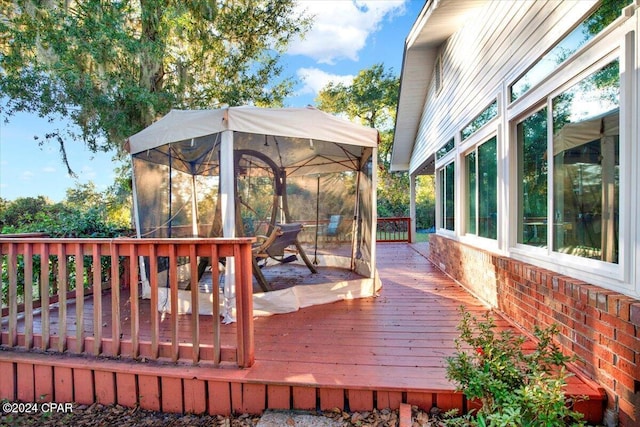 deck featuring a sunroom