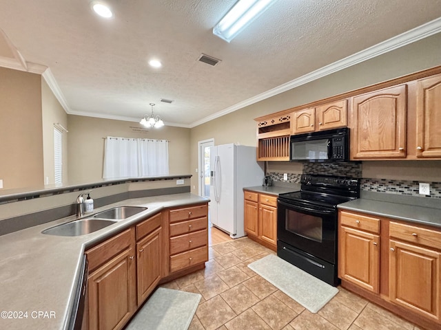 kitchen with sink, an inviting chandelier, ornamental molding, and black appliances