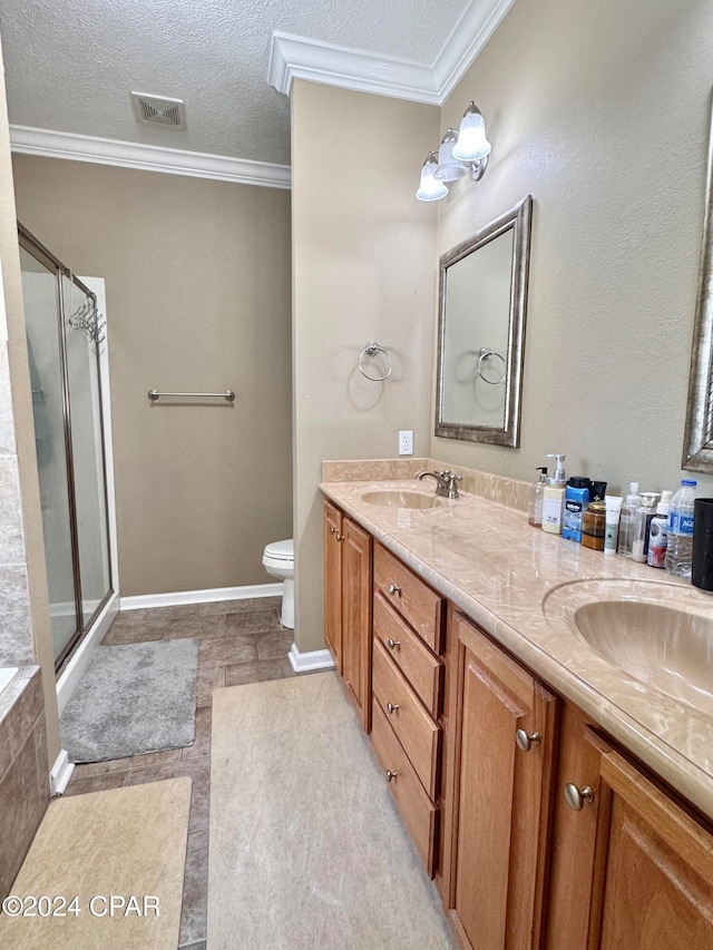 full bathroom with separate shower and tub, vanity, a textured ceiling, and ornamental molding