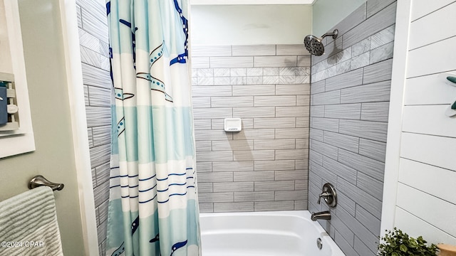 bathroom featuring shower / bath combination with curtain