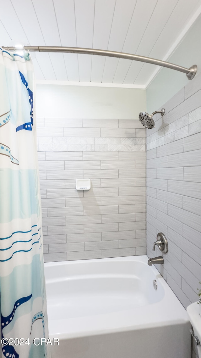 bathroom with shower / bath combo