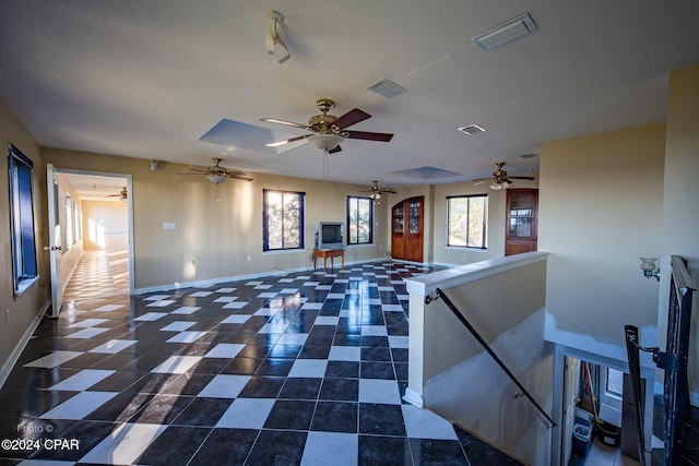 interior space with a textured ceiling