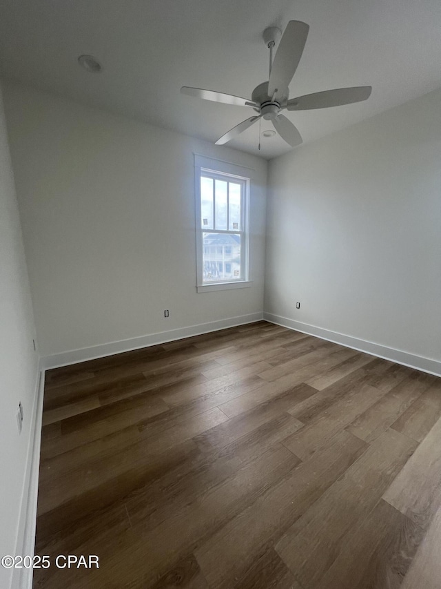 unfurnished room with hardwood / wood-style floors and ceiling fan