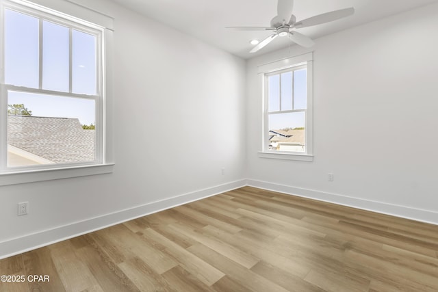 unfurnished room featuring light wood-style floors, recessed lighting, a ceiling fan, and baseboards