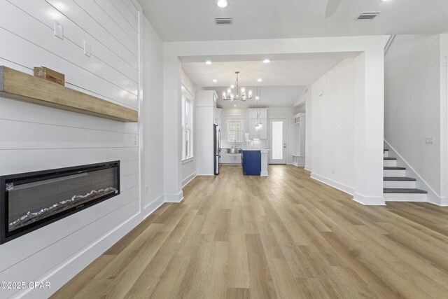 spare room featuring dark wood-type flooring and ceiling fan