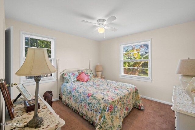 carpeted bedroom with ceiling fan