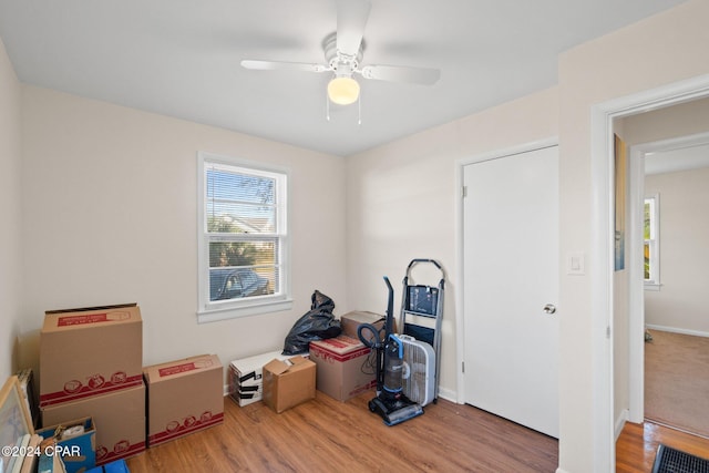 miscellaneous room with ceiling fan and wood-type flooring