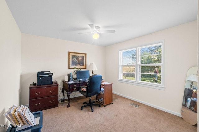 home office with ceiling fan and light colored carpet