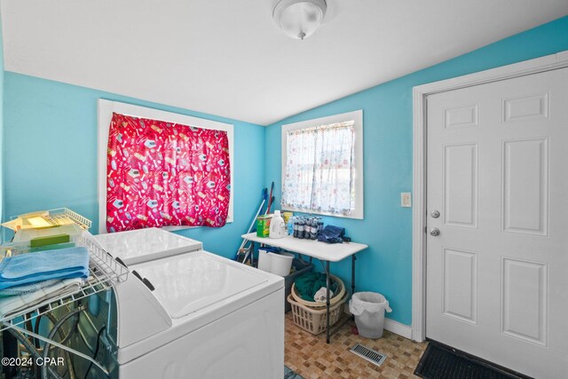 laundry room with separate washer and dryer