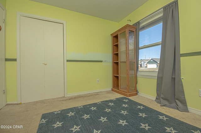 unfurnished bedroom featuring carpet flooring