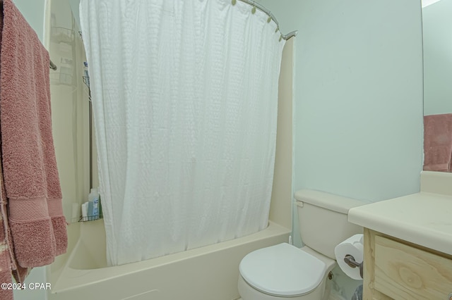 full bathroom with vanity, toilet, and shower / bathtub combination with curtain