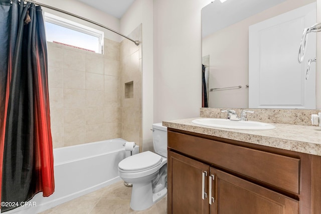 full bathroom featuring tile patterned flooring, shower / bath combination with curtain, vanity, and toilet