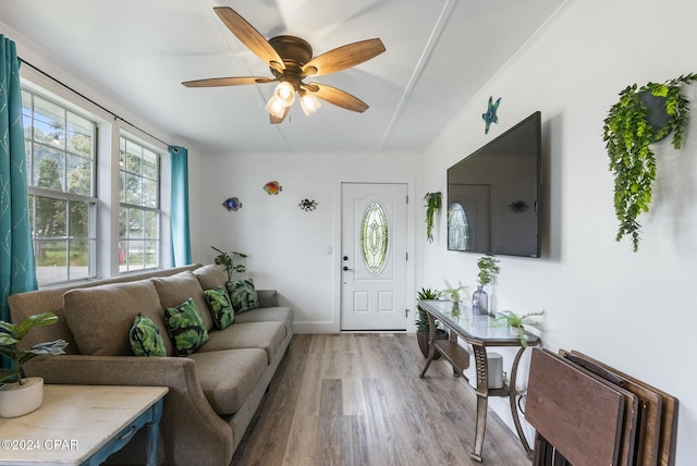 interior space featuring hardwood / wood-style floors and ceiling fan