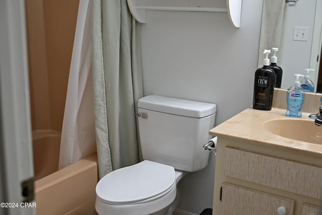 full bathroom with vanity, toilet, and shower / bath combo with shower curtain