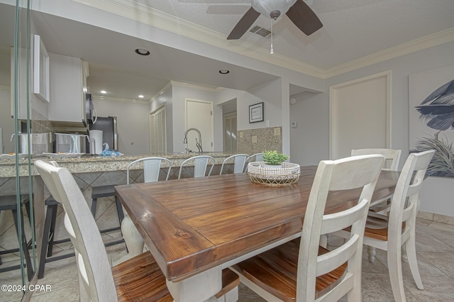 living room featuring crown molding