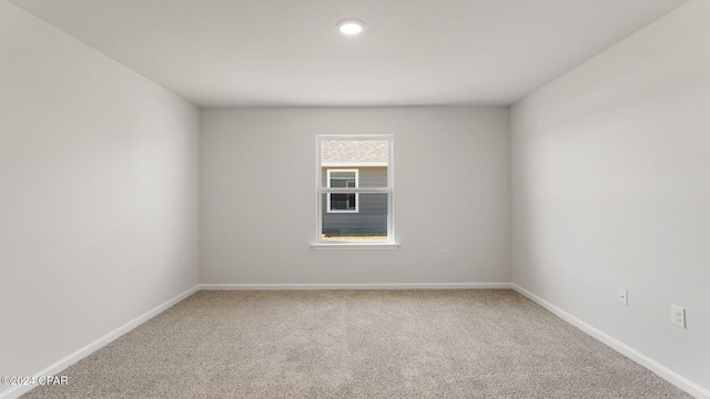 view of carpeted spare room