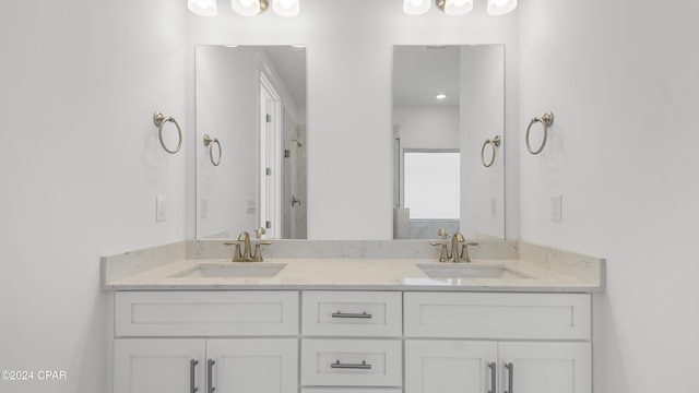 bathroom with vanity and walk in shower