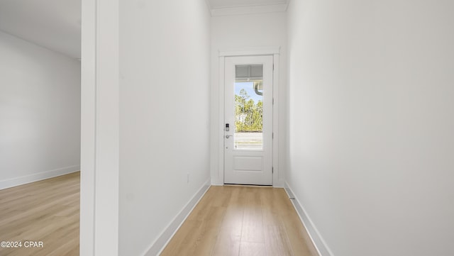 doorway to outside with light hardwood / wood-style floors