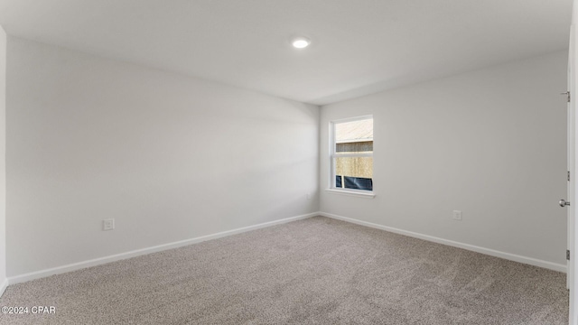 view of carpeted spare room