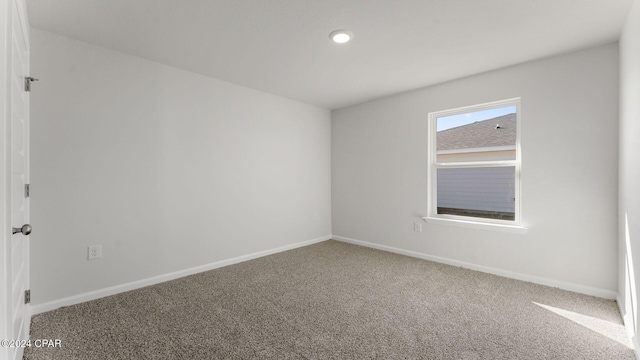 view of carpeted spare room