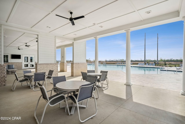 view of patio / terrace featuring french doors and ceiling fan